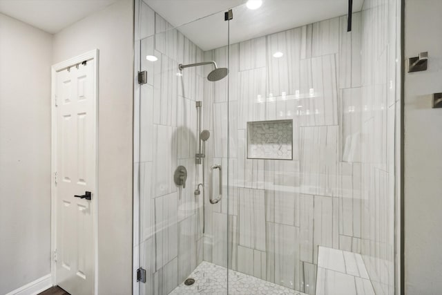 bathroom with an enclosed shower