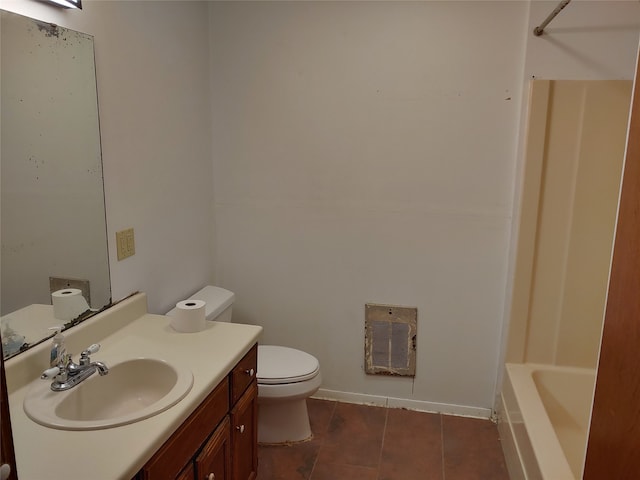 full bathroom with vanity, toilet, tile patterned floors, and washtub / shower combination