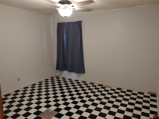 spare room featuring ceiling fan