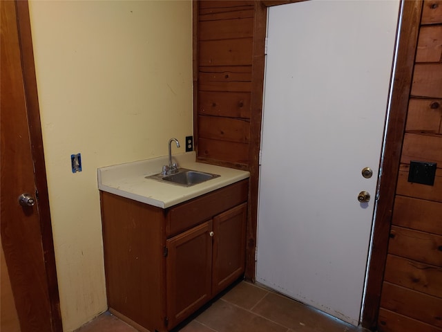 bathroom featuring vanity and tile patterned flooring