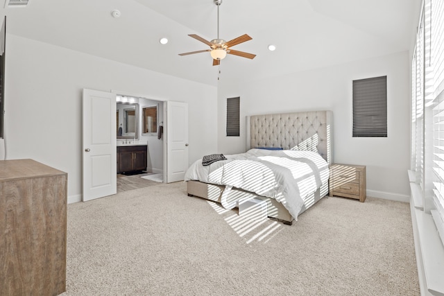 bedroom with ceiling fan, multiple windows, and light colored carpet