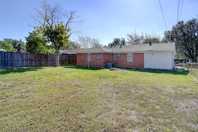 view of yard featuring central AC