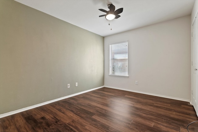 unfurnished room featuring dark hardwood / wood-style floors and ceiling fan