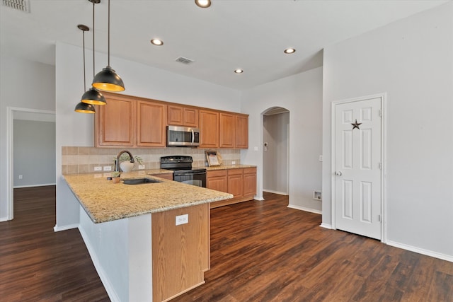 kitchen featuring black / electric stove, light stone countertops, dark wood-type flooring, and sink