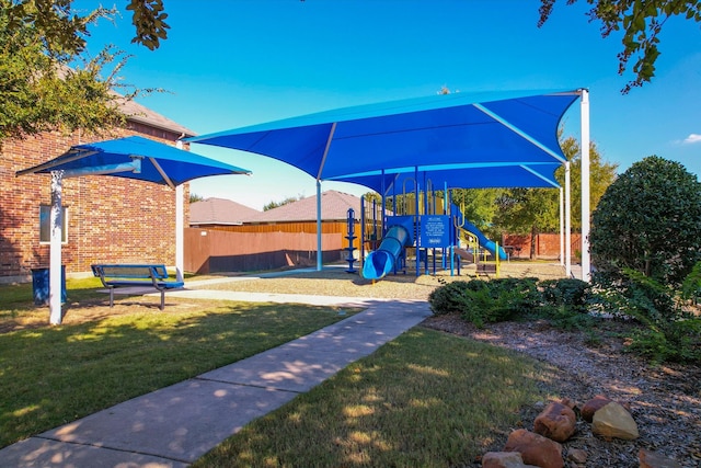 view of jungle gym featuring a yard