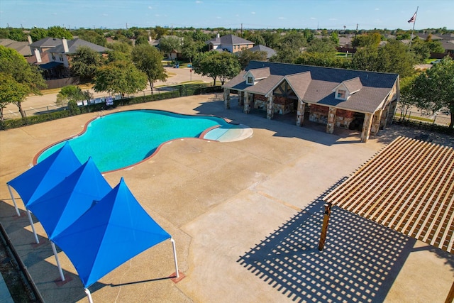 view of pool featuring a patio