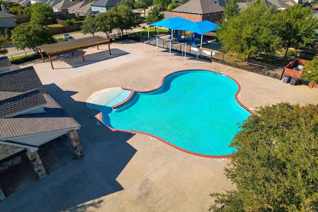 view of swimming pool featuring a patio