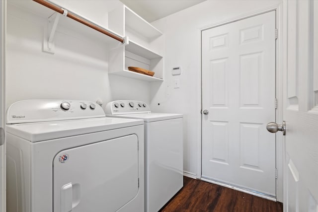 washroom featuring independent washer and dryer and dark wood-type flooring