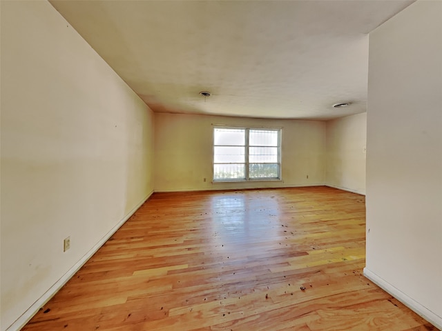 empty room with light wood-type flooring