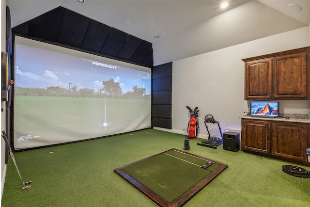 playroom featuring lofted ceiling, carpet floors, and golf simulator