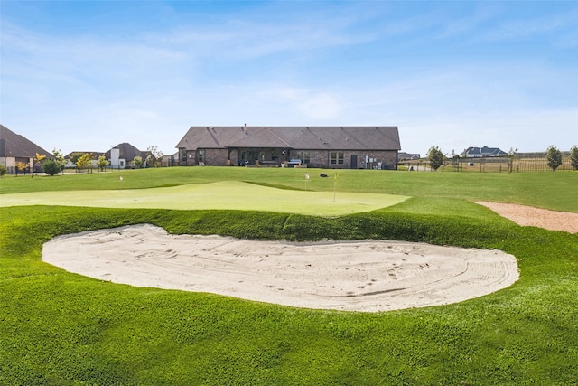 view of community featuring a lawn