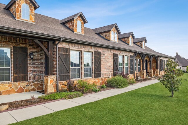 7817 Bella Flora Dr, Fort Worth, TX 76126 - exterior space featuring a shingled roof, a front lawn, and brick siding