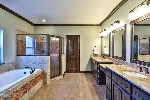 bathroom featuring vanity, crown molding, tile patterned flooring, and plus walk in shower