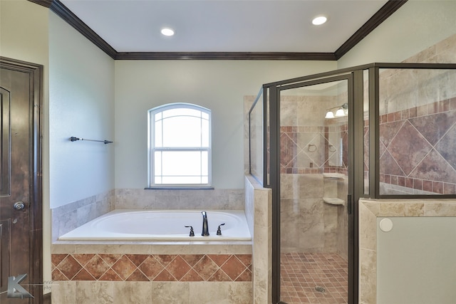 bathroom featuring ornamental molding and plus walk in shower