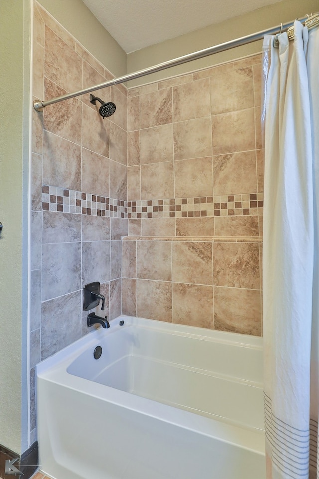 bathroom with shower / tub combo