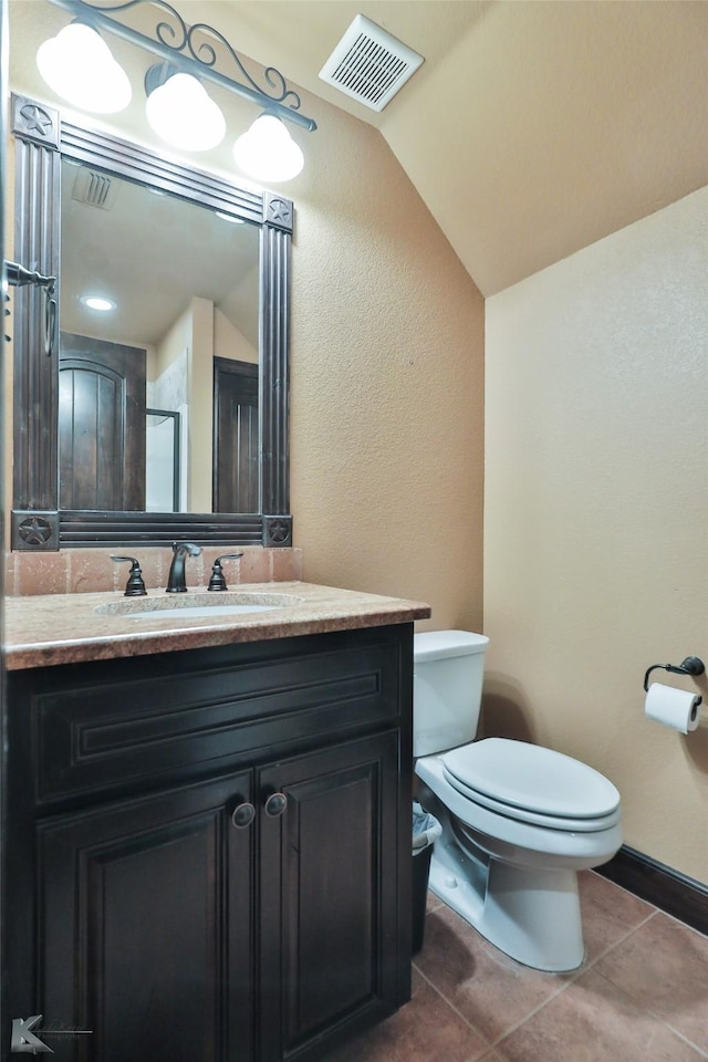 133 Prairie Creek Way, Abilene, TX 79602 - bathroom with toilet, vanity, a textured wall, and tile patterned floors