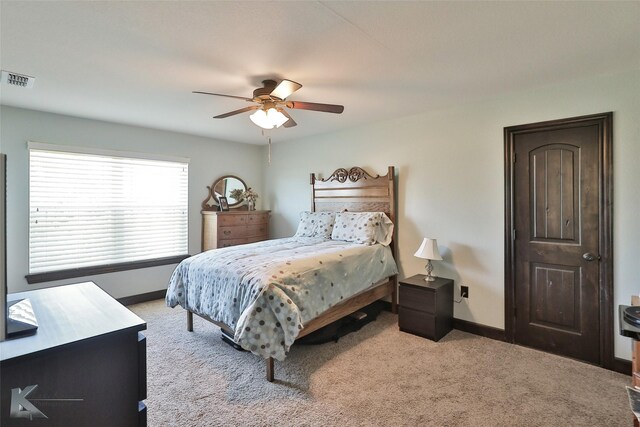 bathroom featuring vanity, vaulted ceiling, toilet, and tile patterned floors