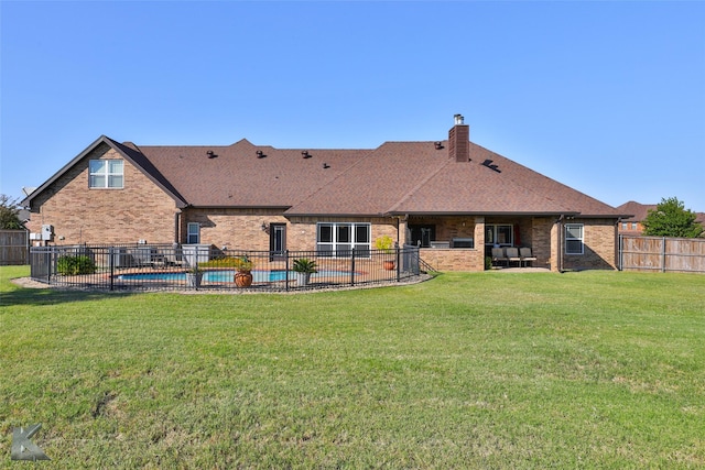 133 Prairie Creek Way, Abilene, TX 79602 - back of house with brick siding, a patio, a chimney, and a shingled roof