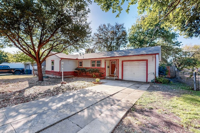 single story home featuring a garage