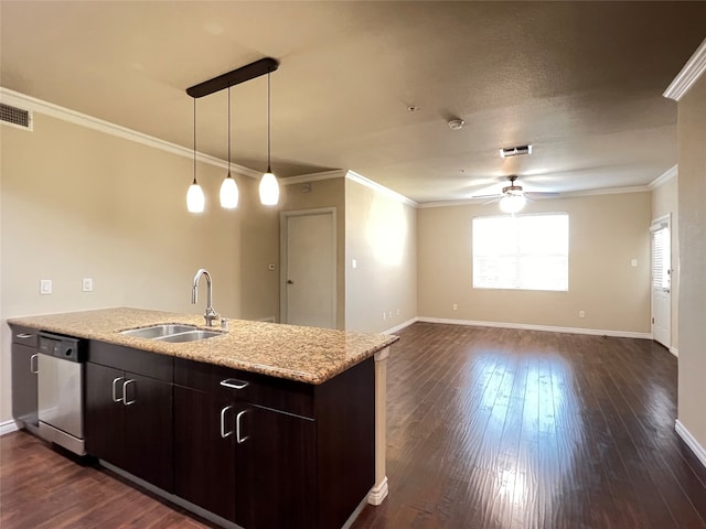 kitchen featuring dark wood-type flooring, sink, crown molding, dark brown cabinetry, and stainless steel dishwasher