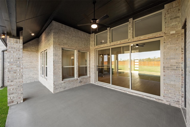 view of patio featuring ceiling fan