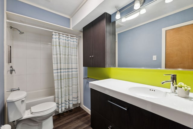 full bathroom with vanity, hardwood / wood-style flooring, toilet, and shower / bath combo with shower curtain