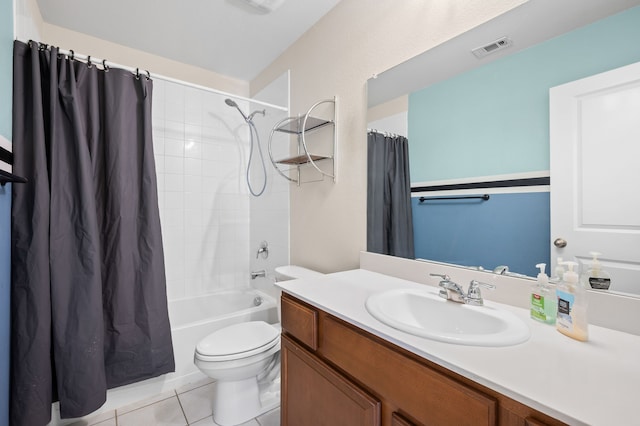 full bathroom with vanity, shower / bath combo, toilet, and tile patterned flooring