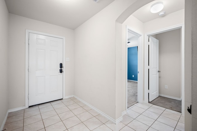 entrance foyer with light tile patterned floors