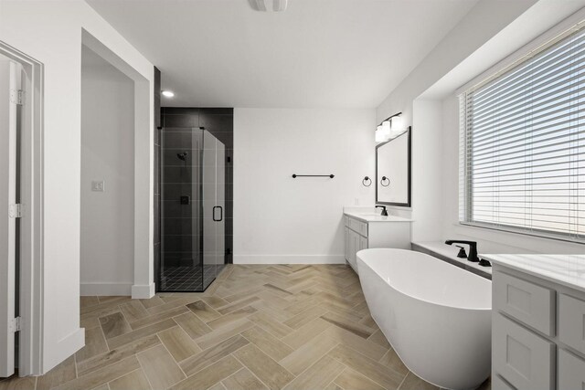 bathroom featuring independent shower and bath and vanity