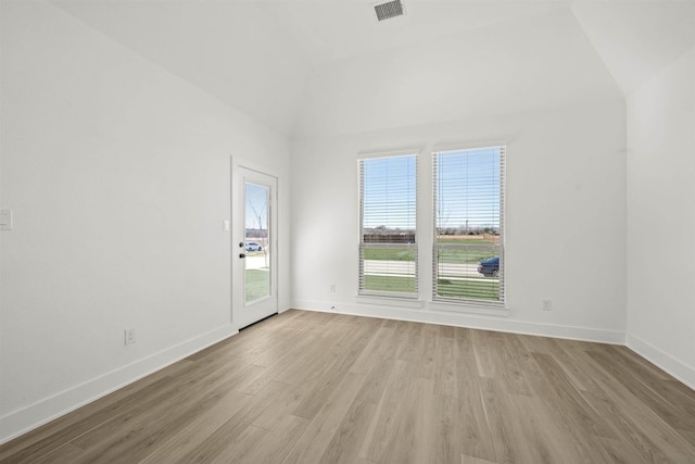 unfurnished room featuring light hardwood / wood-style flooring