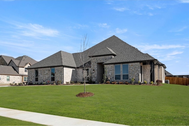 view of front of home with a front yard