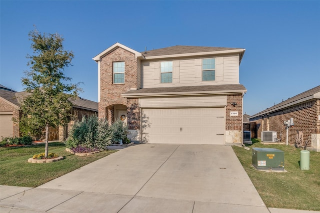 view of property with a garage, a front lawn, and cooling unit