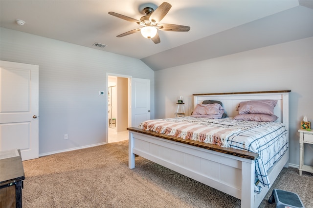 carpeted bedroom with ceiling fan and lofted ceiling