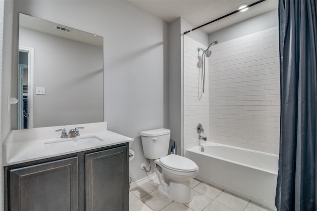 full bathroom featuring tile patterned floors, vanity, toilet, and shower / tub combo with curtain