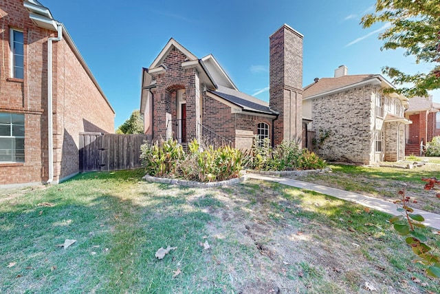 view of front facade with a front yard