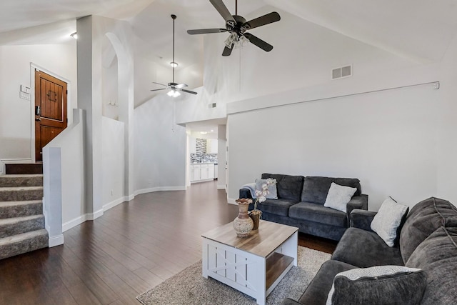 living room with high vaulted ceiling, dark wood-type flooring, and ceiling fan