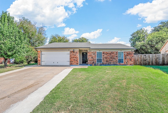 ranch-style house with a front yard and a garage