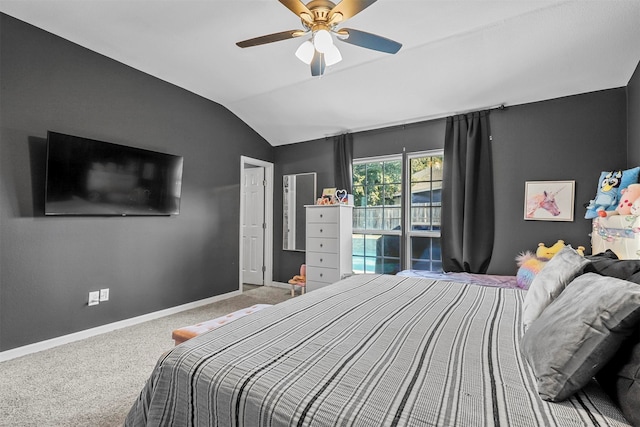 carpeted bedroom with ceiling fan and lofted ceiling