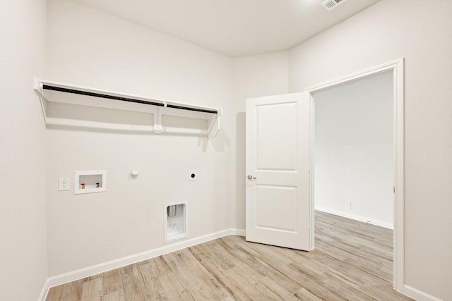 laundry room featuring hookup for an electric dryer, gas dryer hookup, light wood-type flooring, and washer hookup