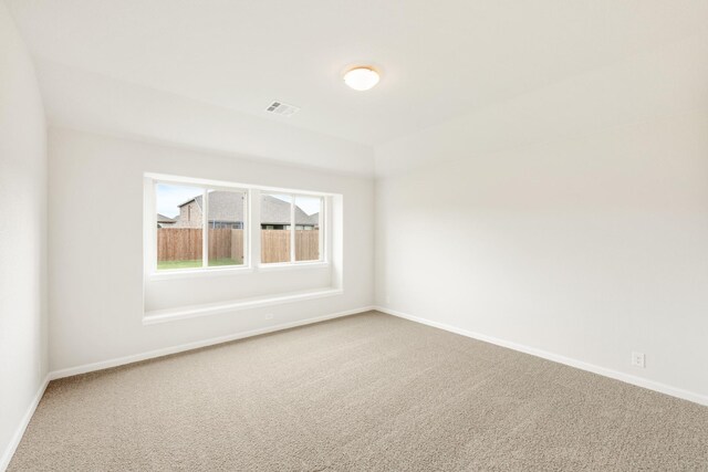 unfurnished room with carpet