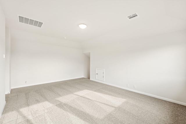 bedroom featuring light carpet