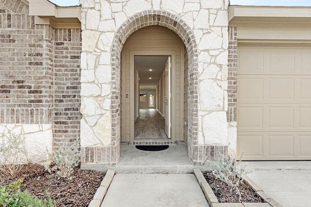 property entrance featuring a garage