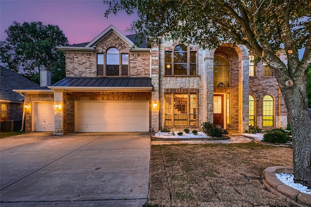 view of front of property with a garage