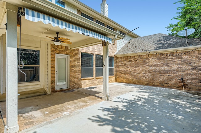 view of patio / terrace featuring ceiling fan