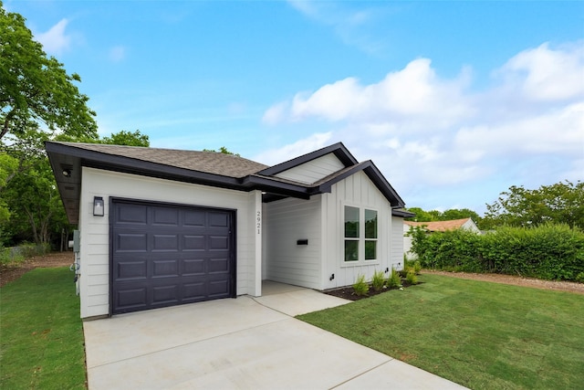 ranch-style house featuring a garage and a front lawn