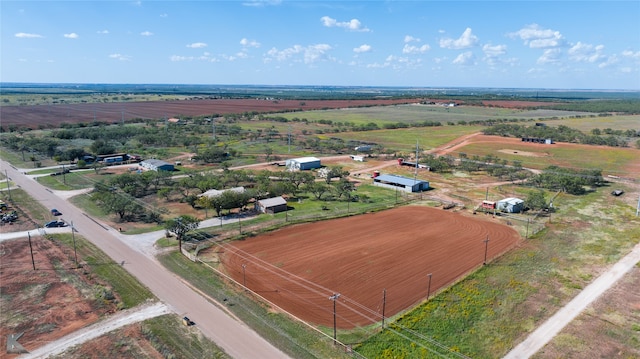 birds eye view of property featuring a rural view