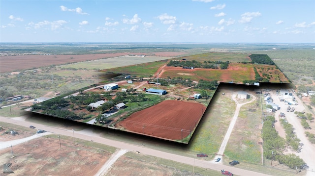 birds eye view of property featuring a rural view