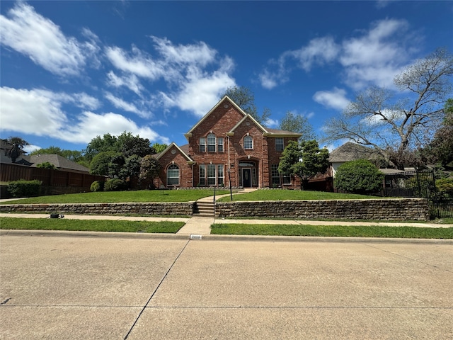 view of front of house with a front lawn