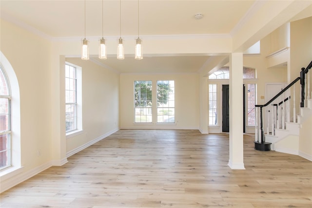3004 Normandy Dr, Mckinney, TX 75070 - foyer with light wood-style flooring, crown molding, baseboards, and stairs