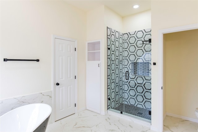 3004 Normandy Dr, Mckinney, TX 75070 - bathroom with marble finish flooring, a freestanding tub, a shower stall, recessed lighting, and toilet